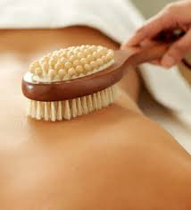 EXFOLIATING BY SKIN BRUSHING